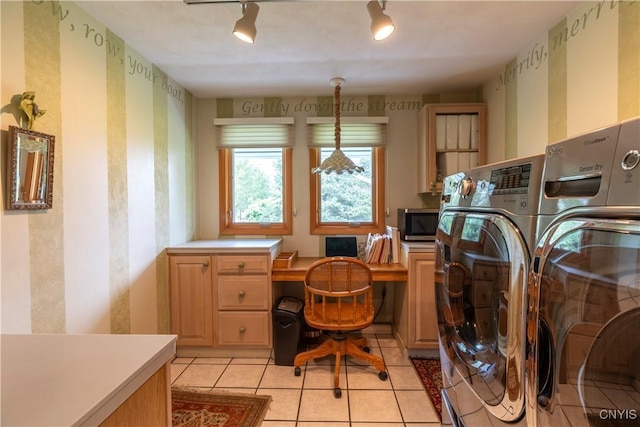 1664 S Ivy, Lysander, NY 13027 - laundry area featuring washing machine and dryer, an office area, light tile patterned floors, and cabinet space