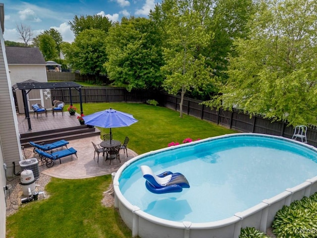 8228 Dampier Cir, Clay, NY 13090 - view of swimming pool featuring a wooden deck, a fenced backyard, and a patio