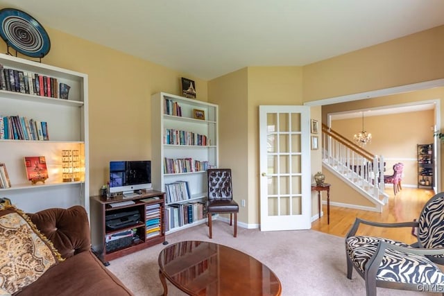 8228 Dampier Cir, Clay, NY 13090 - living room with a chandelier and carpet