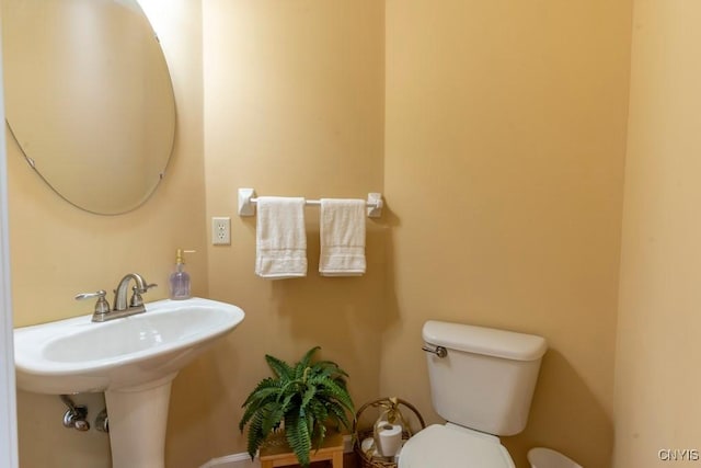 8228 Dampier Cir, Clay, NY 13090 - half bathroom featuring toilet and a sink