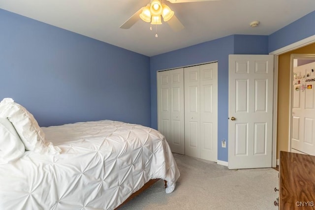 8228 Dampier Cir, Clay, NY 13090 - bedroom featuring light carpet, a closet, and a ceiling fan