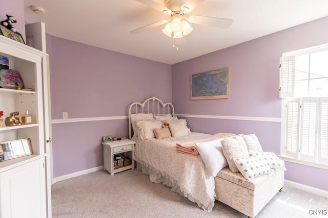 8228 Dampier Cir, Clay, NY 13090 - carpeted bedroom with ceiling fan and baseboards