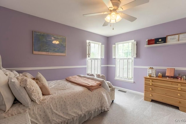 8228 Dampier Cir, Clay, NY 13090 - carpeted bedroom with baseboards and a ceiling fan