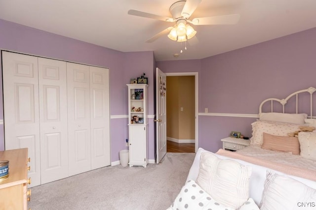8228 Dampier Cir, Clay, NY 13090 - bedroom with carpet floors, a closet, and a ceiling fan