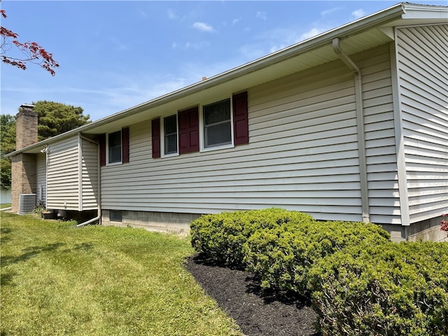 75 Towpath Ln, Brighton, NY 14618 - view of side of property with a yard and a chimney