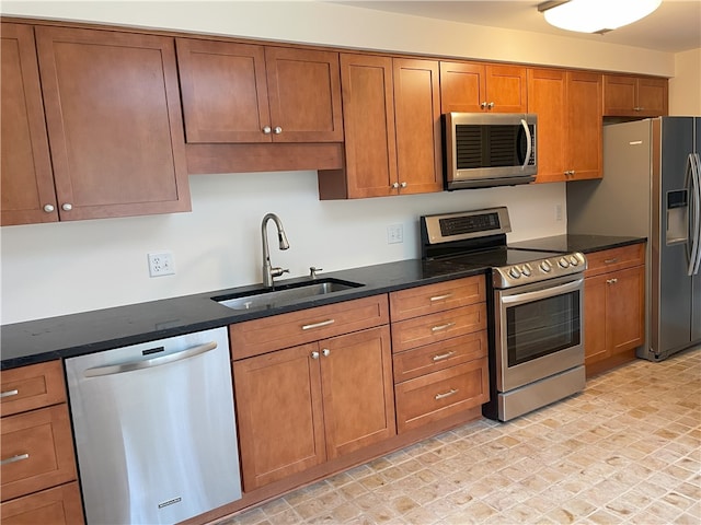75 Towpath Ln, Brighton, NY 14618 - kitchen with stainless steel appliances and brown cabinets