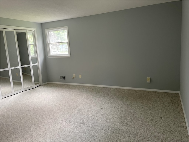 75 Towpath Ln, Brighton, NY 14618 - carpeted empty room featuring baseboards