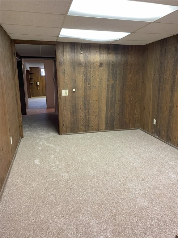 75 Towpath Ln, Brighton, NY 14618 - finished basement featuring a paneled ceiling, wooden walls, and carpet floors