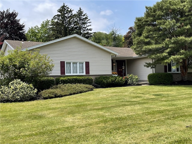 75 Towpath Ln, Brighton, NY 14618 - single story home with a front lawn and a shingled roof