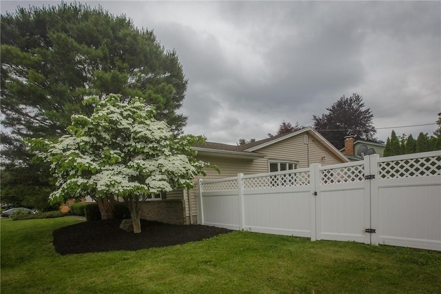 75 Towpath Ln, Brighton, NY 14618 - view of yard with a garage