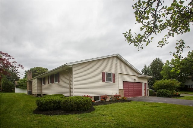 75 Towpath Ln, Brighton, NY 14618 - view of property exterior with asphalt driveway, a yard, a chimney, and an attached garage