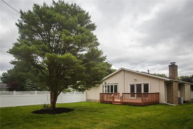 75 Towpath Ln, Brighton, NY 14618 - back of property featuring a wooden deck and a chimney