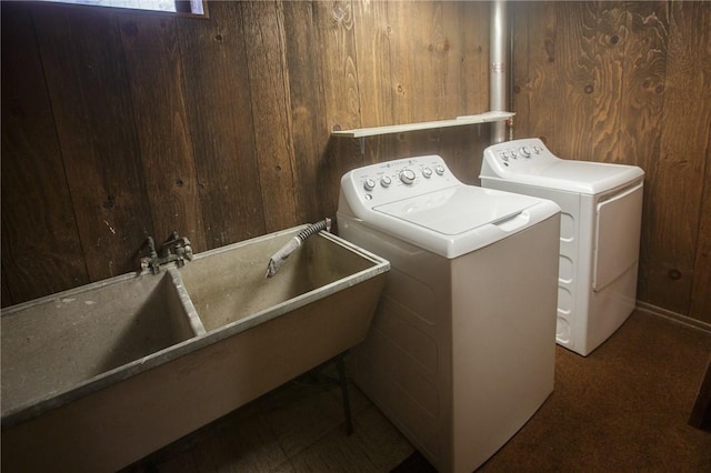 75 Towpath Ln, Brighton, NY 14618 - washroom with independent washer and dryer and wood walls