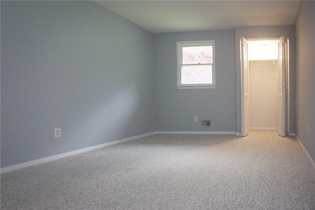 75 Towpath Ln, Brighton, NY 14618 - unfurnished bedroom with light carpet and baseboards