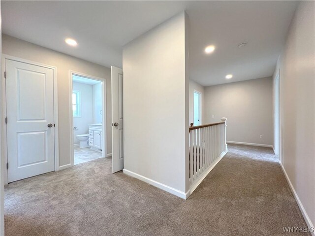 122 Winterbrook Dr, Amherst, NY 14228 - hallway with carpet, an upstairs landing, and recessed lighting