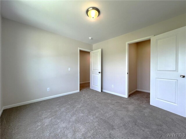 122 Winterbrook Dr, Amherst, NY 14228 - unfurnished bedroom with carpet floors and baseboards