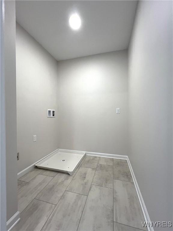 122 Winterbrook Dr, Amherst, NY 14228 - laundry room with hookup for a washing machine and wood finished floors