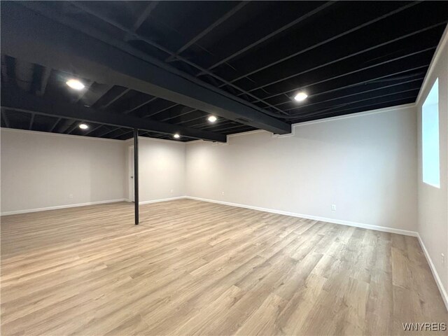 122 Winterbrook Dr, Amherst, NY 14228 - finished below grade area featuring baseboards and light wood-style floors