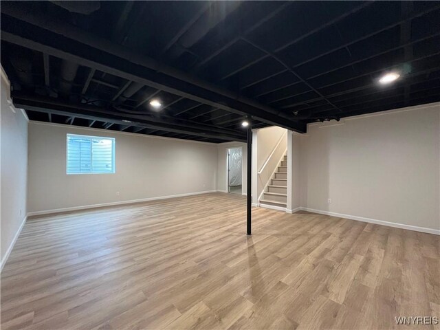 122 Winterbrook Dr, Amherst, NY 14228 - below grade area with stairway and light wood-style floors