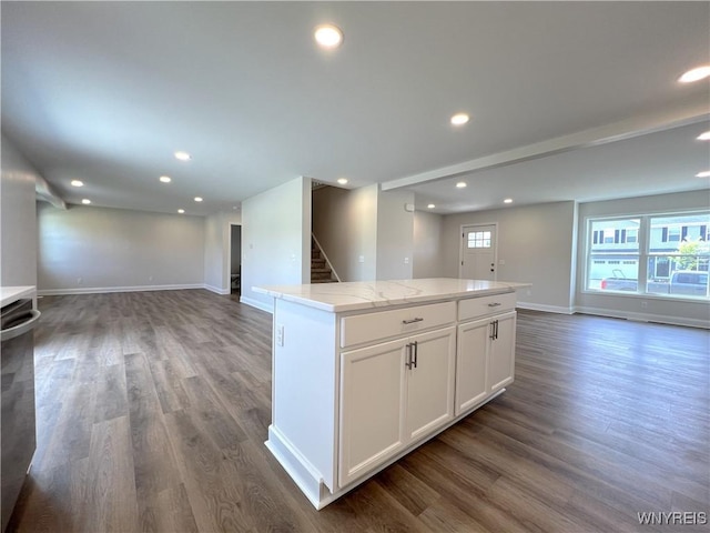 122 Winterbrook Dr, Amherst, NY 14228 - kitchen featuring open floor plan, dark wood-type flooring, a kitchen island, white cabinetry, and recessed lighting