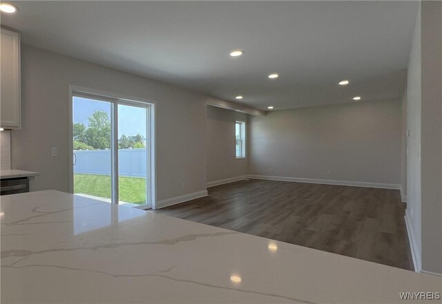 122 Winterbrook Dr, Amherst, NY 14228 - empty room featuring wood finished floors and recessed lighting