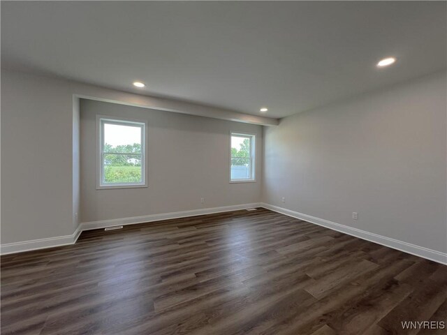 122 Winterbrook Dr, Amherst, NY 14228 - empty room with recessed lighting and dark wood-style flooring