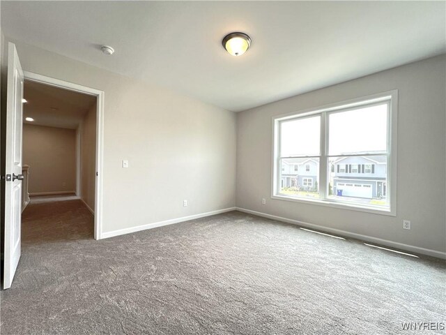 122 Winterbrook Dr, Amherst, NY 14228 - carpeted spare room with baseboards and a smoke detector
