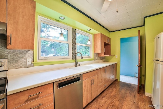 425 Tryon Dr, Lewiston, NY 14092 - kitchen with dishwasher, freestanding refrigerator, dark wood-type flooring, and tasteful backsplash