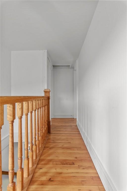1870 Carey Rd, Franklin, NY 13775 - corridor with light wood-type flooring and an upstairs landing