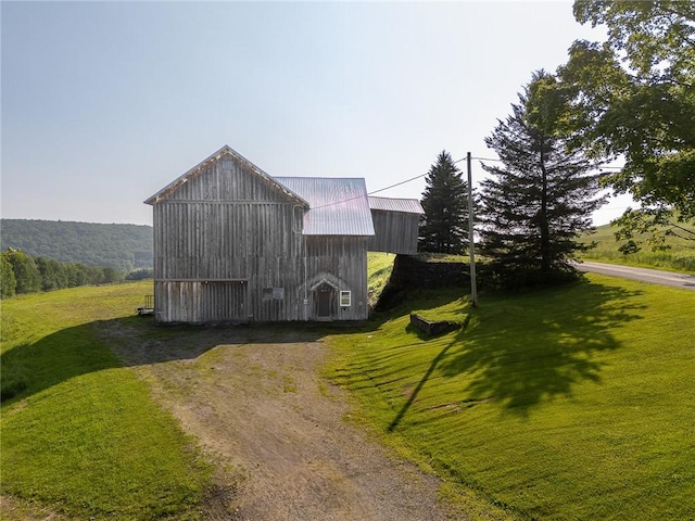1870 Carey Rd, Franklin, NY 13775 - view of barn featuring dirt driveway and a lawn