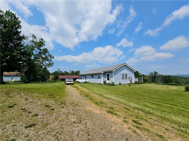 2313 Stickle Rd, Addison, NY 14801 - single story home with a front lawn and dirt driveway