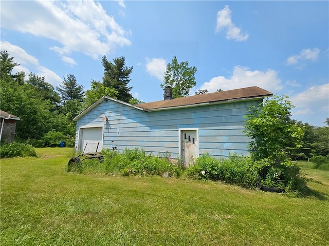 2313 Stickle Rd, Addison, NY 14801 - back of house with a garage, a yard, and a chimney