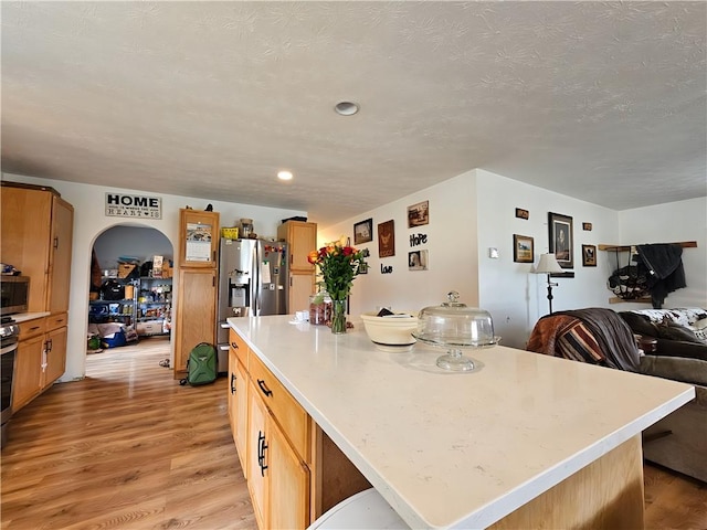 2313 Stickle Rd, Addison, NY 14801 - kitchen with light wood finished floors, a kitchen island, light countertops, open floor plan, and recessed lighting