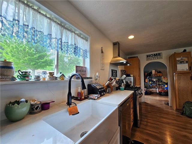 2313 Stickle Rd, Addison, NY 14801 - kitchen featuring wall chimney exhaust hood, appliances with stainless steel finishes, light countertops, dark wood-style floors, and recessed lighting