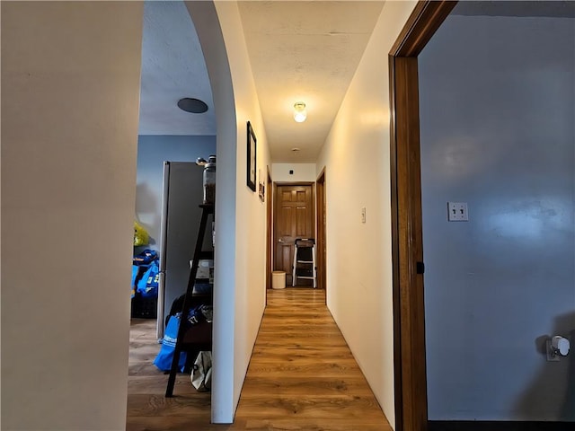2313 Stickle Rd, Addison, NY 14801 - hall featuring arched walkways and wood finished floors