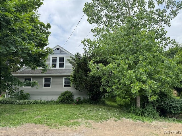 11052 S Lake Rd, Pavilion, NY 14525 - view of home's exterior featuring a yard