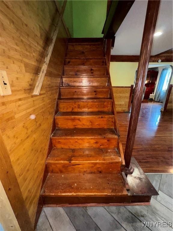 11052 S Lake Rd, Pavilion, NY 14525 - stairs featuring hardwood / wood-style flooring and wood walls