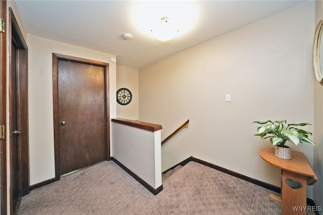 6193 New Taylor Rd, Orchard Park, NY 14127 - hallway with an upstairs landing and carpet floors