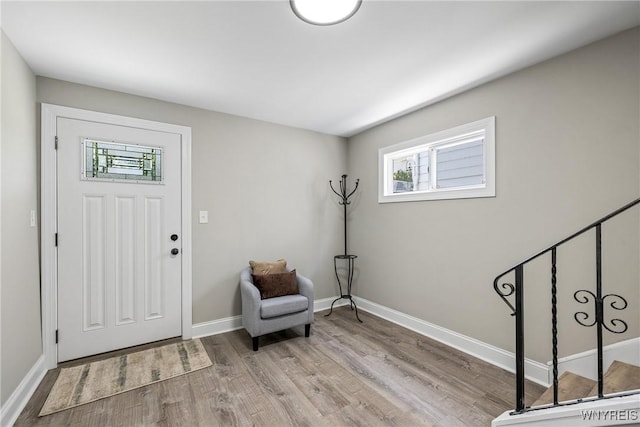 362 W Delavan Ave Unit N, Buffalo, NY 14213 - entrance foyer with light wood finished floors and stairway