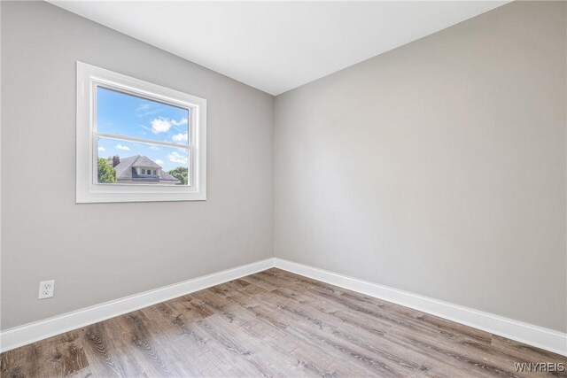 362 W Delavan Ave Unit N, Buffalo, NY 14213 - empty room featuring wood finished floors and baseboards