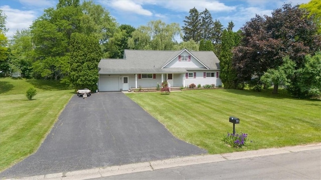 40 Colleen, Henrietta, NY 14534 - view of front of property with a garage, asphalt driveway, a front yard, and covered porch