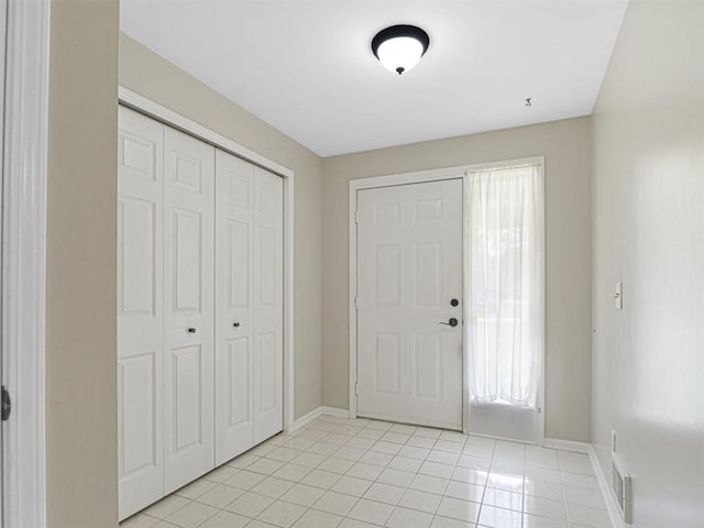 40 Colleen, Henrietta, NY 14534 - foyer featuring light tile patterned flooring and baseboards