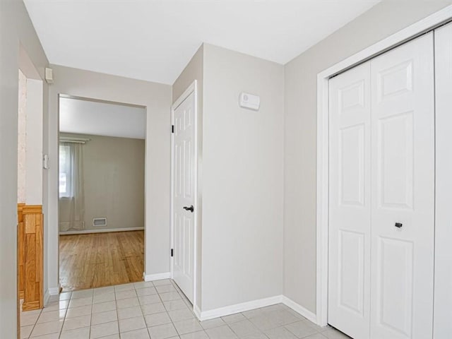 40 Colleen, Henrietta, NY 14534 - corridor with light tile patterned floors and baseboards