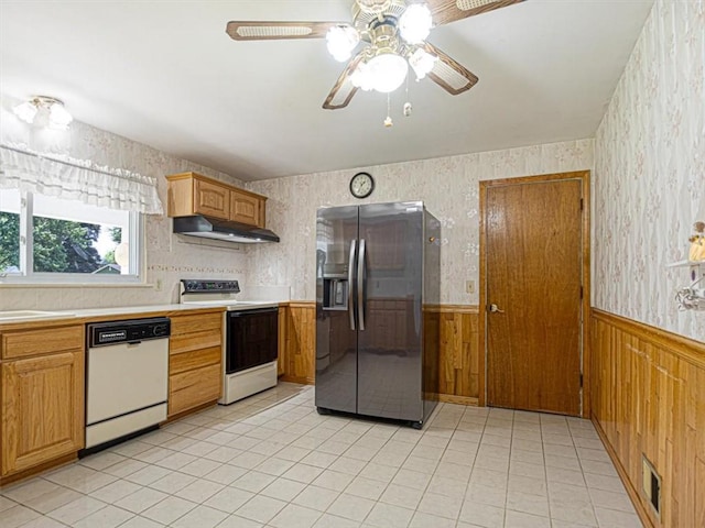 40 Colleen, Henrietta, NY 14534 - kitchen featuring white appliances, under cabinet range hood, a wainscoted wall, light countertops, and a ceiling fan