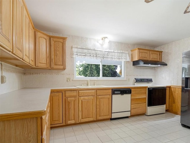 40 Colleen, Henrietta, NY 14534 - kitchen featuring white dishwasher, electric stove, under cabinet range hood, backsplash, and light countertops