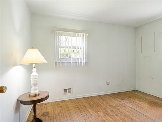 40 Colleen, Henrietta, NY 14534 - spare room featuring hardwood / wood-style floors and baseboards
