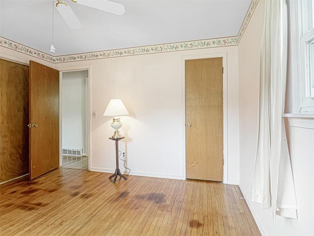 40 Colleen, Henrietta, NY 14534 - empty room with wood finished floors and ceiling fan