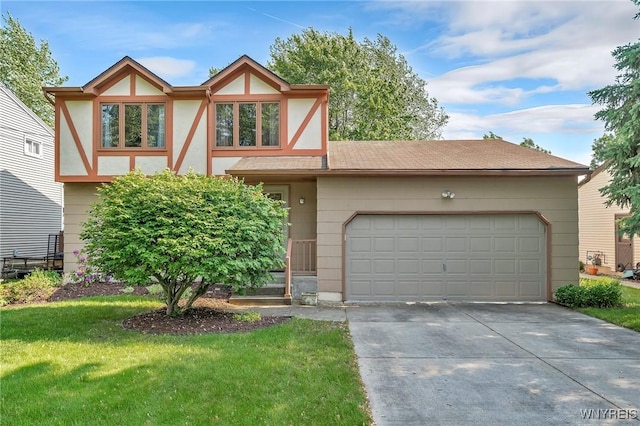 47 Brian Ave, Amherst, NY 14221 - tudor home with driveway, a garage, and a front lawn