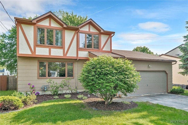 47 Brian Ave, Amherst, NY 14221 - tudor house featuring driveway, a garage, and stucco siding
