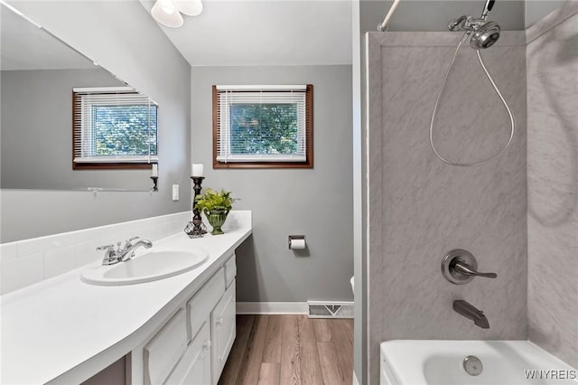 47 Brian Ave, Amherst, NY 14221 - bathroom with vanity, wood finished floors, and bathing tub / shower combination